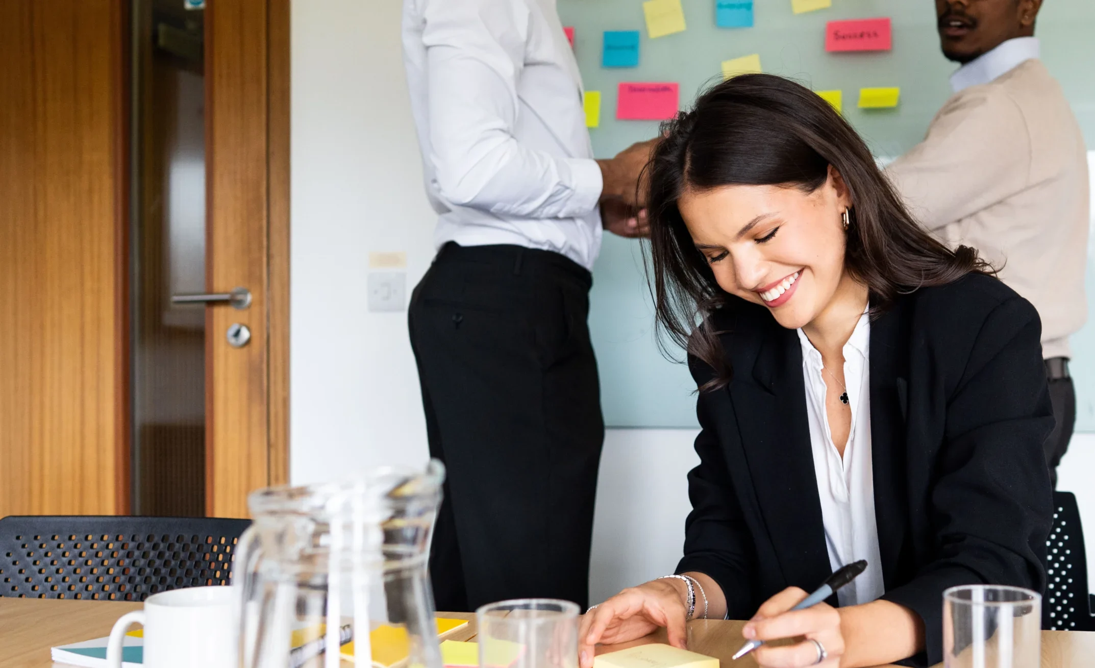 Executive Doctor of Business Administration Aston Online - woman smiling during business strategy session