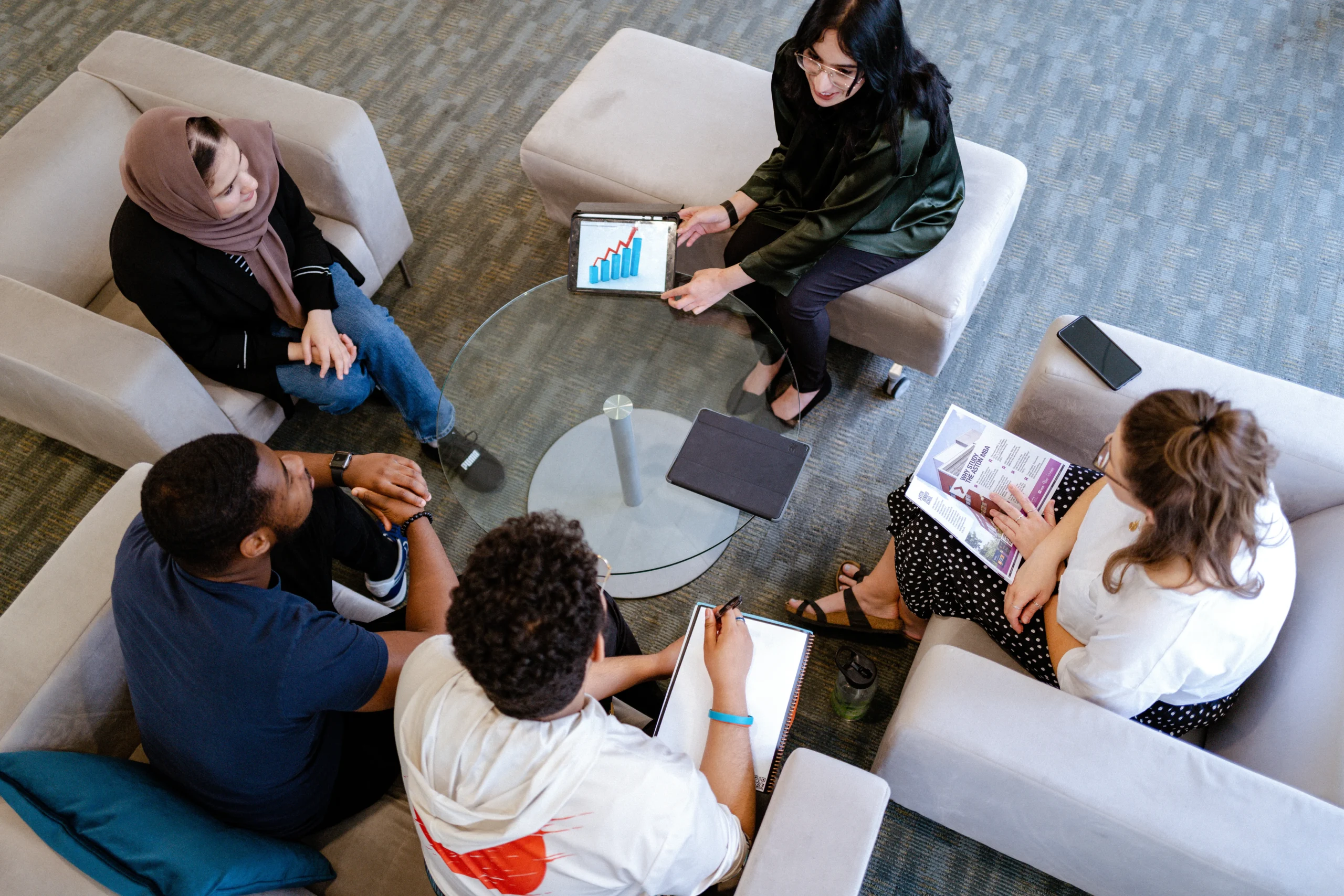 How to become an epidemiologist in the UK - an aerial shot of students in discussion
