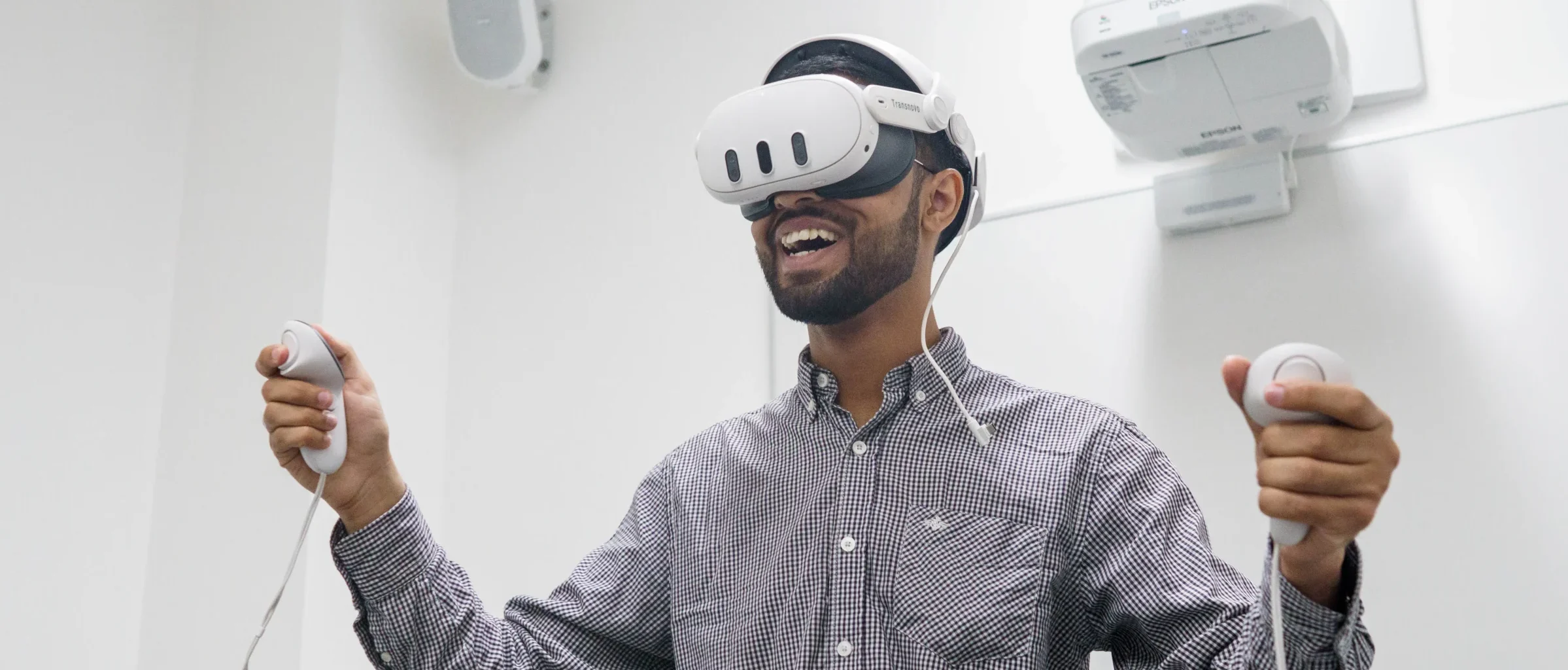 Aston Online - Computer Science MSc - header image - man wearing virtual reality glasses