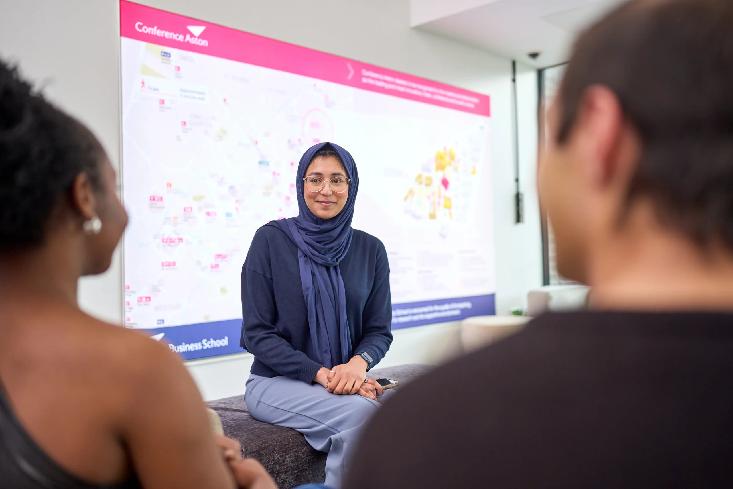 Inside a real-world MSc Business Analytics case study - woman presenting a case study lecture