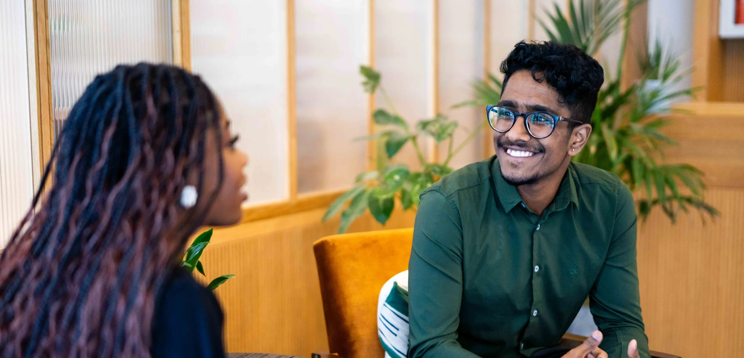Aston Online MBA - students sitting in conversation