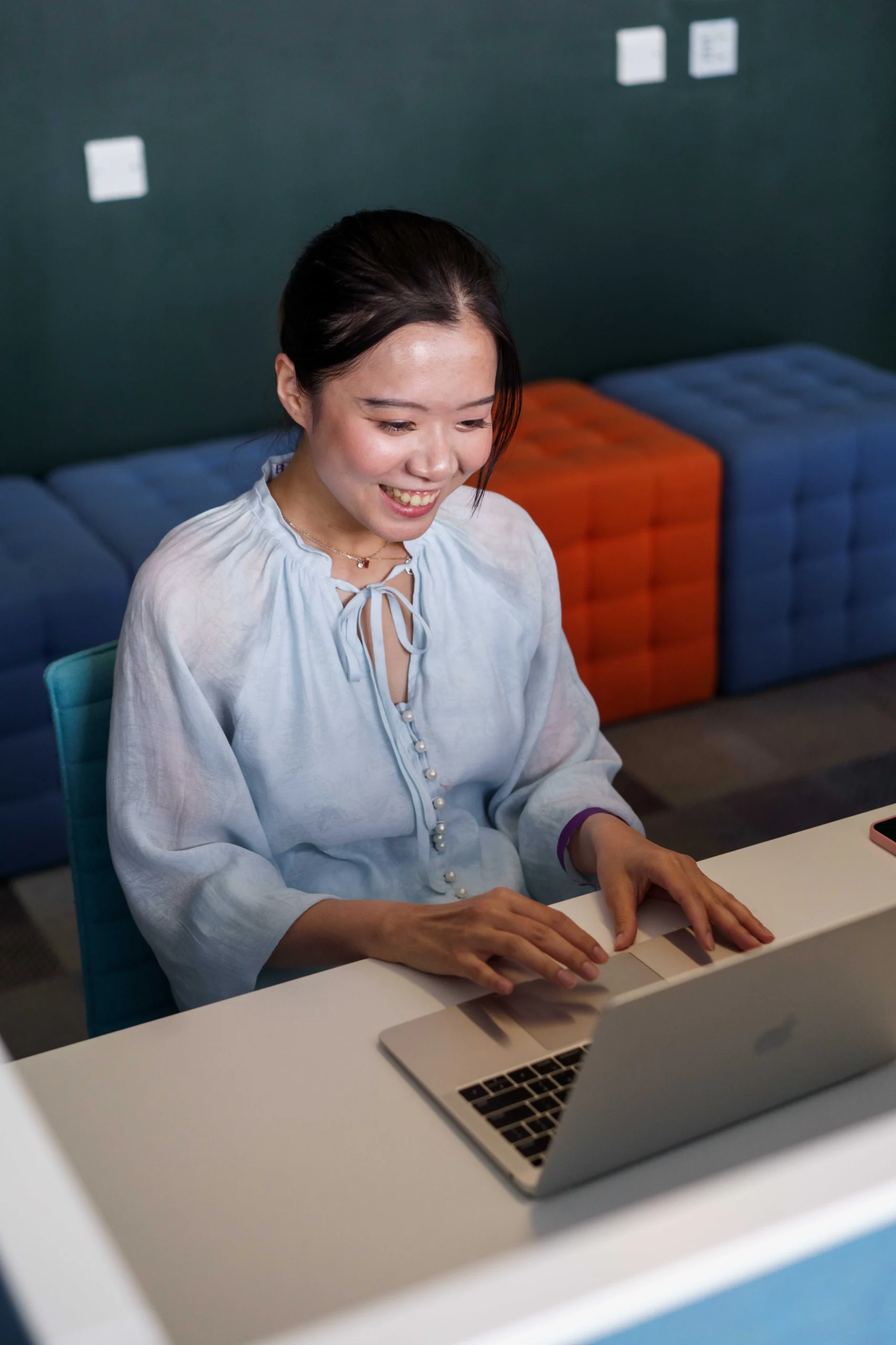 Aston Online - Student Finance England application process - woman working on laptop